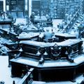 A large, imposing octagonal desk sits in the centre of a room