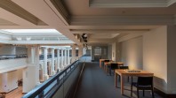 mezzanine view of library space with tables