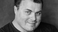 Black and white head shot of author Dougal MacPherson, Reading Matters 2017