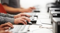 People using computers - keyboards and mouse