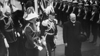 The Prime Minister and Governor General inspecting a line of sailors