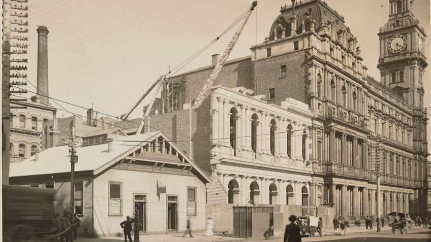 Sepia photo of a tin shed next to Melbourne's post office