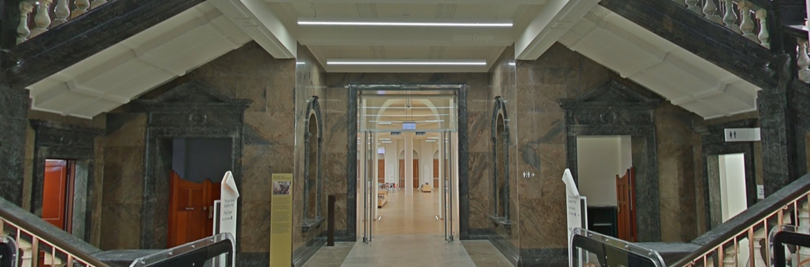 A marble foyer opens onto a grand interior