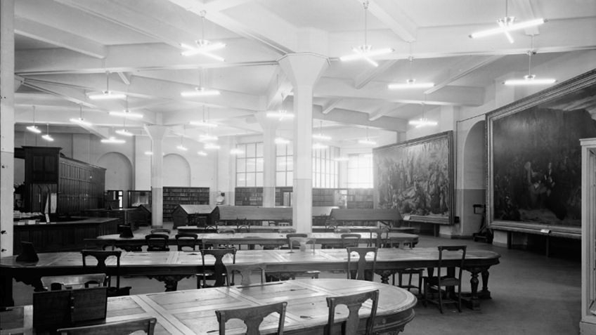 fluoro-lit basement newspapers reading room