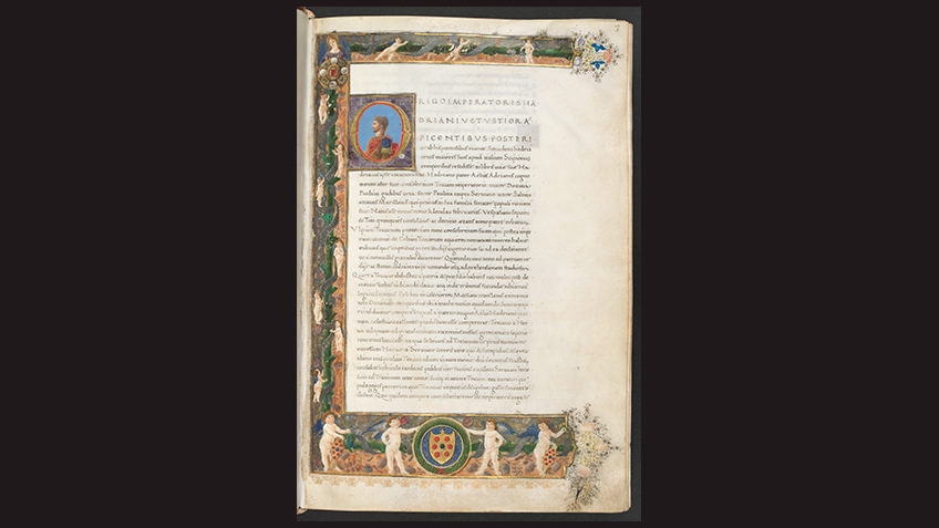 page from medieval manuscript against black background bordered with cherubs
