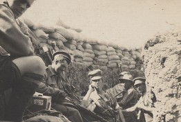 sepia photo of WWI soldiers in a trench