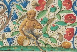 detail of medieval manuscript with monkey