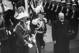 The Prime Minister and Governor General inspecting a line of sailors