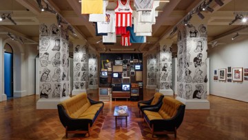 sofas, posters, T-shirts and artworks part of State Library Victoria's summer 2016 3RRR On Air exhibition