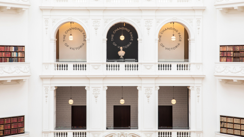 Three arches set within white walls