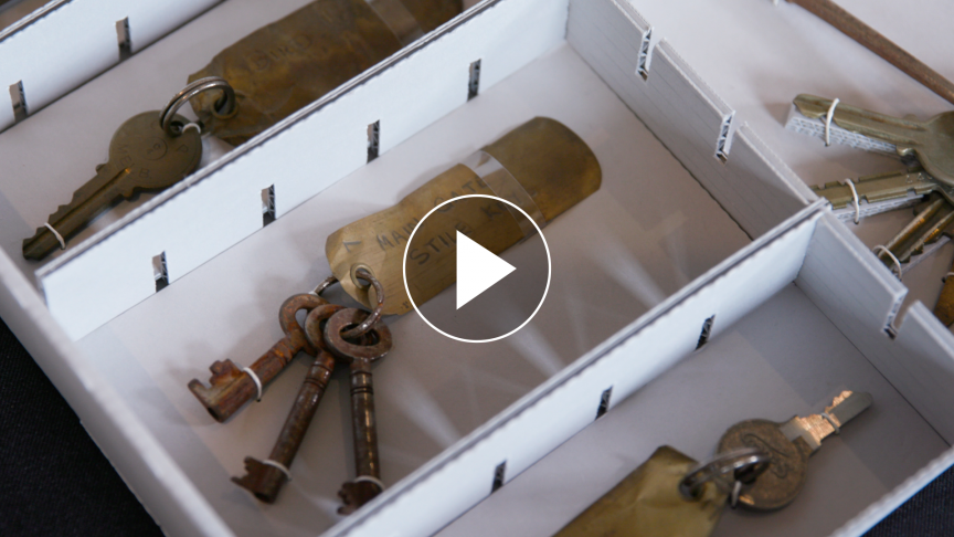 A white box full of old keys