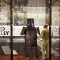 View of Ned Kelly armour on display in the Redmond Barry Reading Room. The armour is in a glass case.